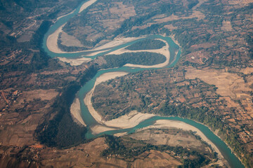 Winding River Through Himalayan Valleys