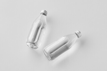 Small water bottle mockup, clear glass