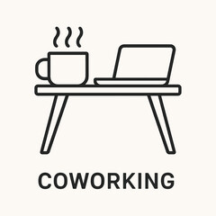 Minimalistic design of a coworking table with a laptop and coffee cup for a productive space