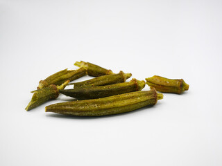 Crunchy and delicious okra chips made from fresh vegetables. Great for concepts of clean eating, healthy lifestyle, plant-based diet, and nutritious vegan food