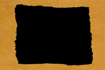 frame made of  tissue paper with torn edges against blank black background