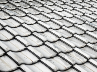 Grey ceramic traditional Japanese roof tiles in diagonal pattern