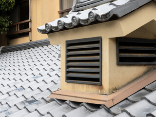 Detail of traditional Japanese house roof with ceramic tiles