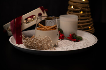 Rompope celebrating christmas with traditional mexican eggnog beverage