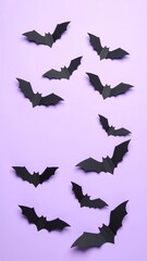 Fototapeta premium Silhouette bats on purple background for Halloween.