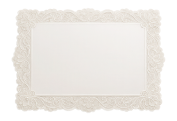 White placemat with ornate lace border.