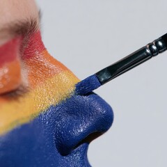 Fototapeta premium Colorful Face Painting with Creative Art Tools and Techniques