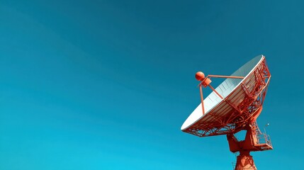 orange satellite dish clear blue sky