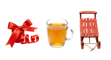 Red gift bow, glass mug of tea, and vintage wooden sled isolated on white background, perfect for holiday and winter celebration themes
