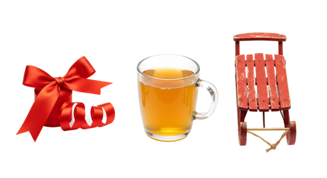 Red gift bow, glass mug of tea, and vintage wooden sled isolated on white background, perfect for holiday and winter celebration themes