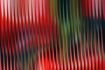 Abstract vertical pleats with a gradient of red and green hues