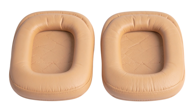 Two light beige ear cushions