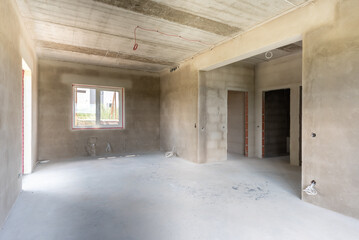 Modern Home Interior Under Construction with Large Glass Window