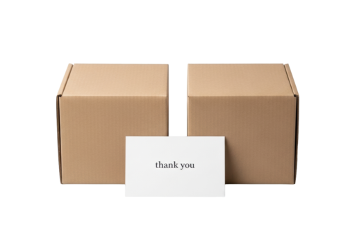 Two kraft boxes and an elegant white 'thank you' card, perfectly aligned on a transparent background, 45-degree high-angle, concept of gratitude