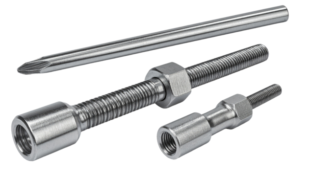 Three metallic components, likely industrial fasteners or rods