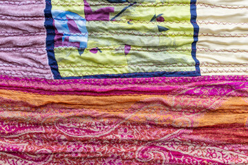 textured surface of pleated silk patchwork fabric