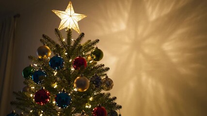 Festive Christmas Tree with Colorful Ornaments and Star - A close-up shot of a decorated Christmas tree adorned with colorful ornaments and a radiant star on top. - Powered by Adobe