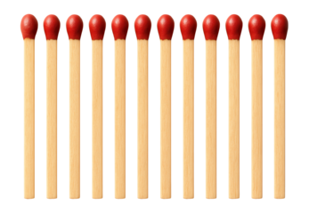Wooden matches aligned in a row on white background.