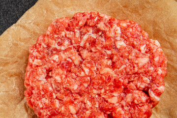 Raw cutlet meat burger ground meat beef, pork fresh natural product tasty snack delicious gourmet food background on the table rustic top view copy space