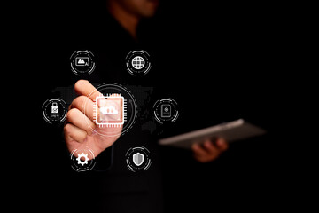 A person interacts with digital icons, showcasing technology and connectivity in a modern, dark-themed environment.