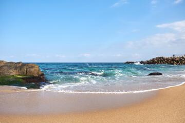 Beach Reef Tide Rushing To Shore With Sandbags