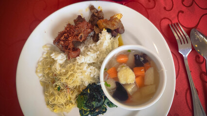 Plate of Rice Noodles Soup and Fried Chicken