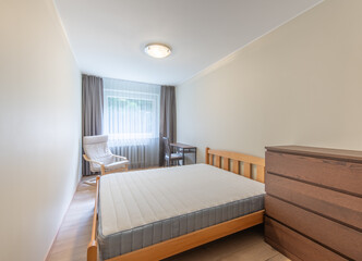 Cozy Minimalist Home Bedroom Interior with Furniture and Natural Lighting