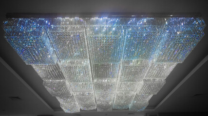 Sparkling Tiered Crystal Chandelier Hanging from Ceiling
