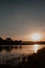 Scenic Sunset View Over a Calm Lake