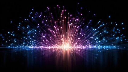A vibrant, radiant display of multicolored light bursts radiating outward, creating a dynamic and spectacular effect against a dark backdrop.