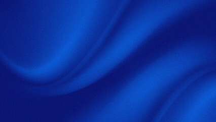 The blue background has a blurry wave or curve pattern, the surface appears to have a rough grain effect