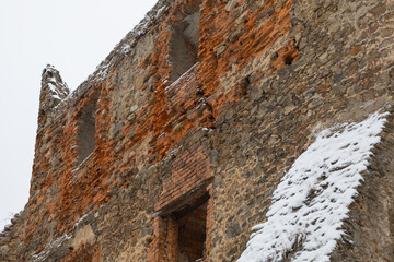 ancient, half-ruined walls of part of an old European castle