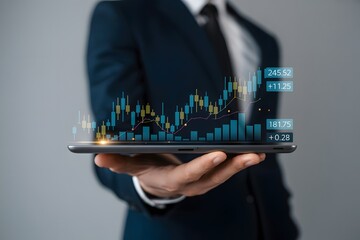 Analyzing stock market data on tablet device for investment strategy and financial growth planning now