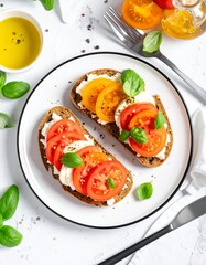 Top-down view of whole grain toast with ricotta, sliced tomatoes, olive oil, black pepper, basil garnish on white plate over marble. Bright, fresh, clean breakfast scene.