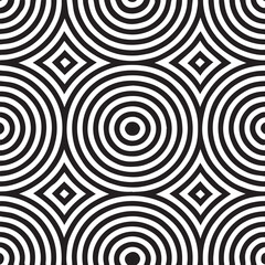 Obraz premium Abstract geometric pattern of concentric circles and diamonds in black and white