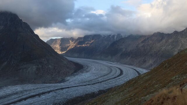 Aletsch glacier in Swiss alps with last rays of sunshine