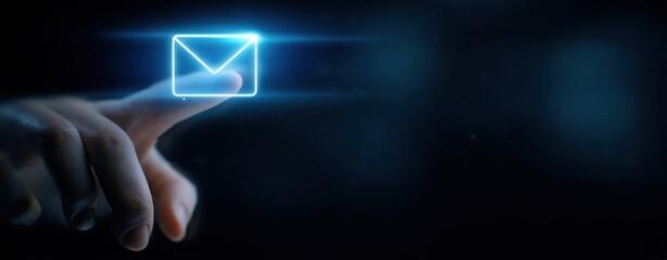 The glowing email icon illuminated by a user's fingertip in digital space.