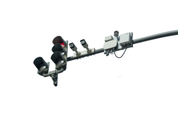 A traffic light with a camera on it