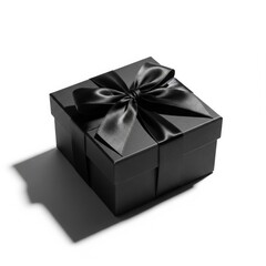 Obraz premium Elegant Black Gift Box with Shiny Ribbon on Clean White Surface with Soft Lighting