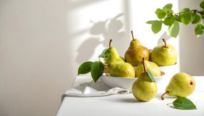 Fresh pears in a bowl, sunlit still life