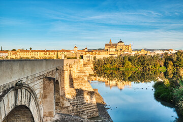 Mezquita Cathedral and Roman Bridge in Cordoba at Sunset, Andalusia