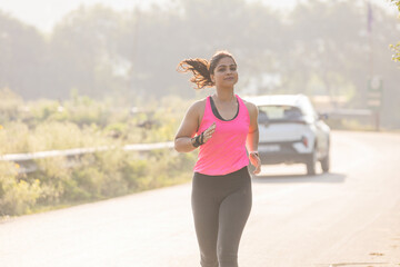 Indian Fitness Couple Standing on Road After Workout