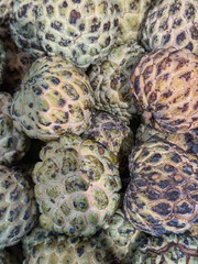 Close-up of a pile of fresh custard apples or anones at a market