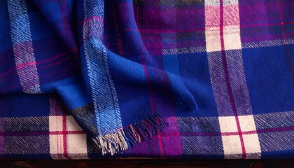 Plaid blanket draped over a surface
