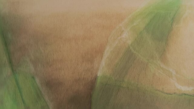 Abstract watercolor wash of muted greens and browns
