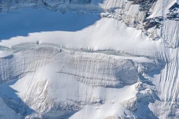 Impressive snow landscape in Alpine region under blue sky