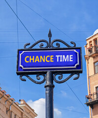 Obraz premium Chance time symbol. Concept word Chance time on beautiful blue road sign. Beautiful blue sky and buildings background. Business chance time concept. Copy space.