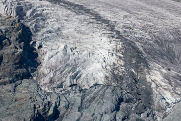 Aerial view of ice formations in snowy mountainous landscape