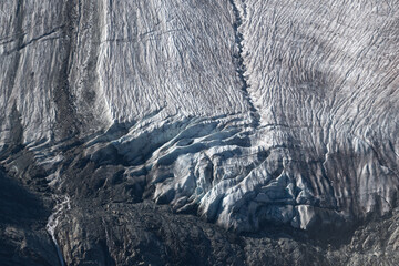 Aerial view of ice formations in snowy mountainous landscape