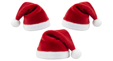 Three red santa hats with white trim and pompoms, isolated on a transparent background, symbolizing christmas and holiday cheer